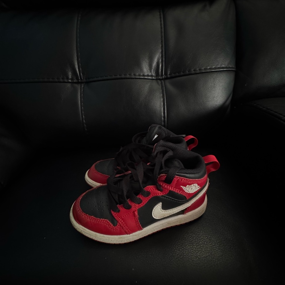 Jordan Red And Black Nike Baby shoes.